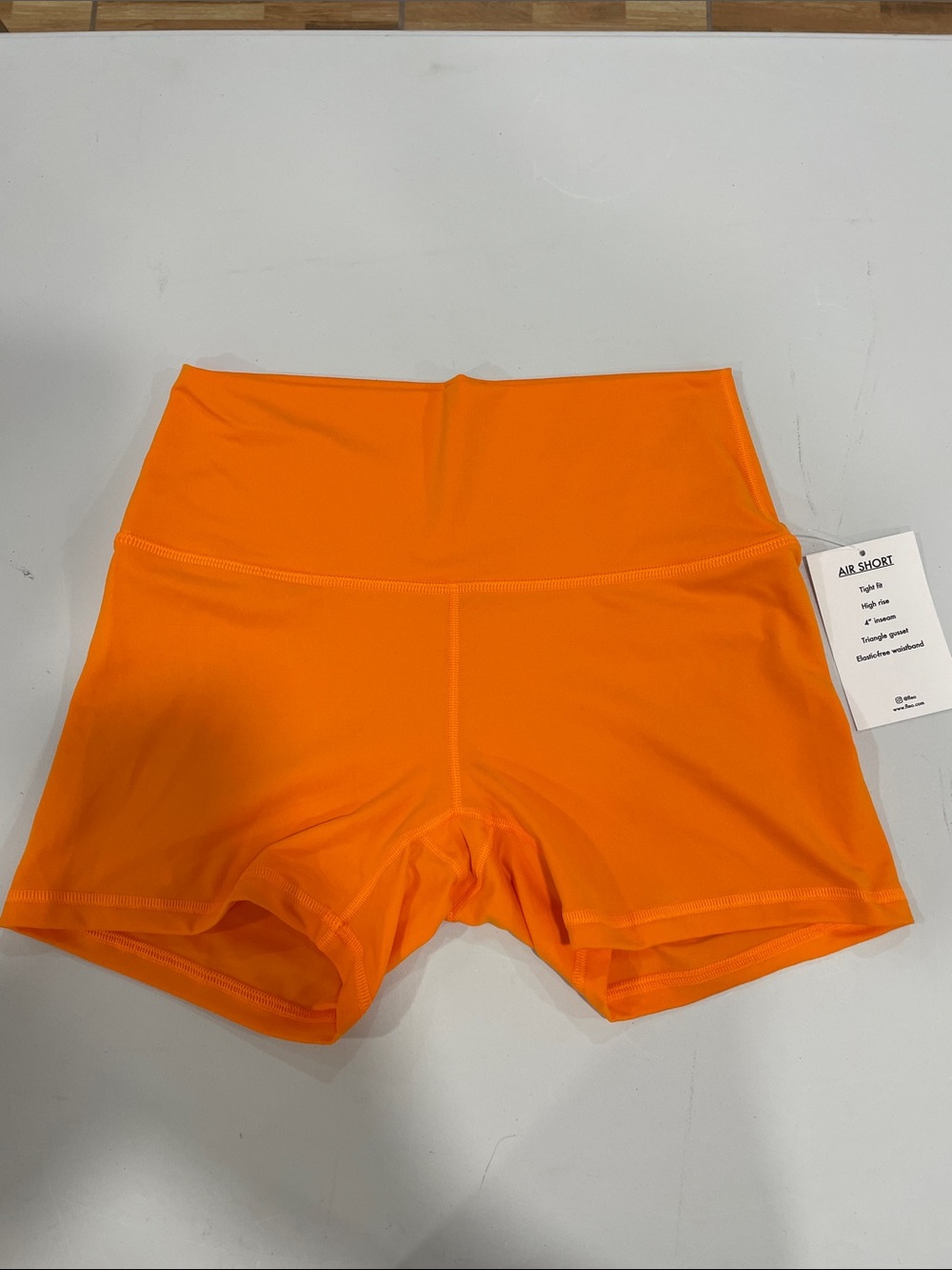 Women’s Fleo Air Short Large new nwt orange tight fit high rise shorts